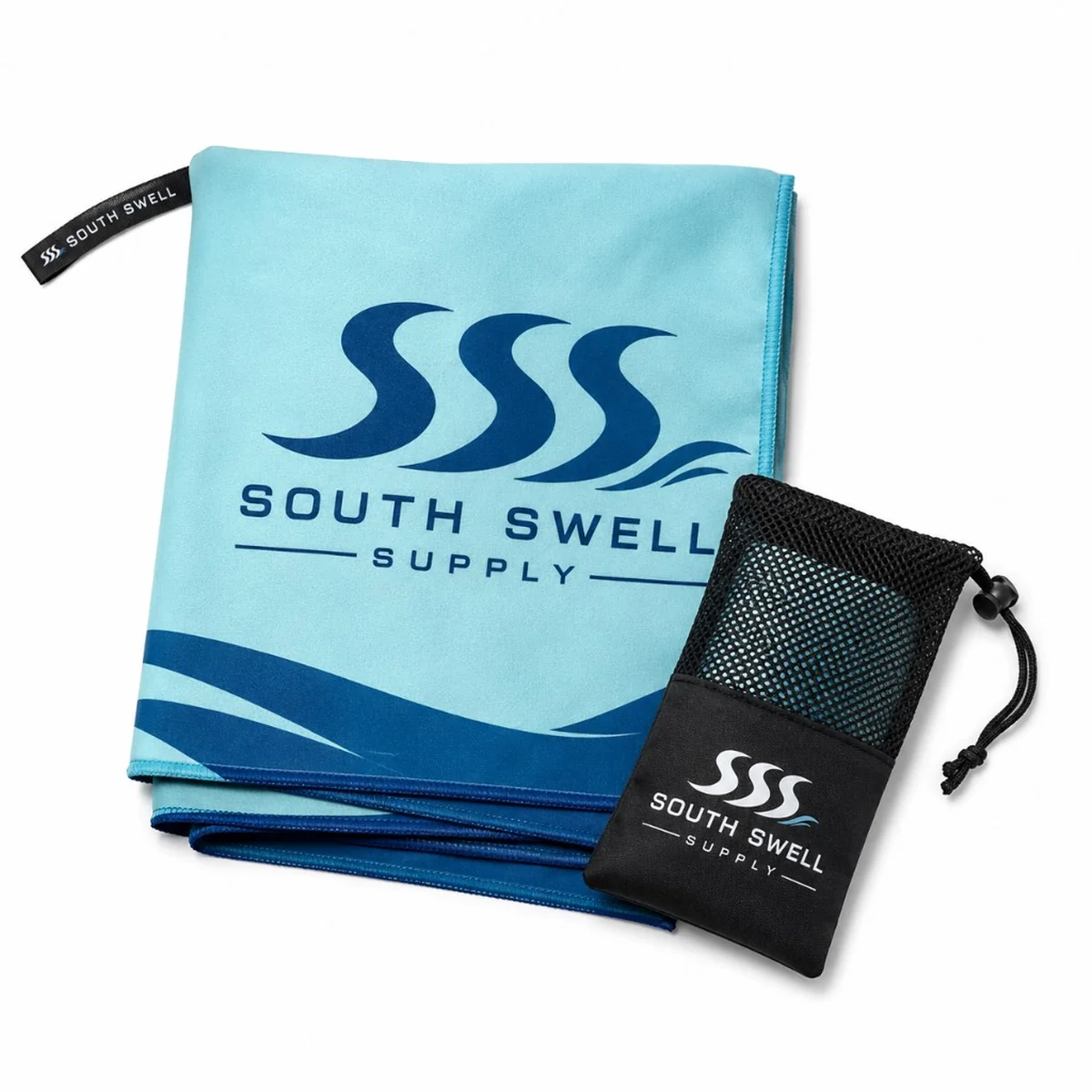 South Swell Supply light blue quick-dry microfibre towel with wave print and black mesh carry pouch — branded beach towels for NZ and AU retailers and resorts.